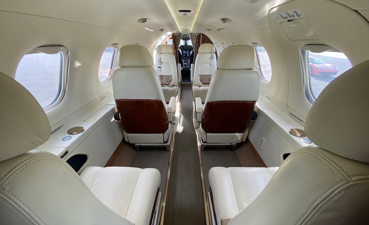 View forward down the cabin aisle toward the flight deck