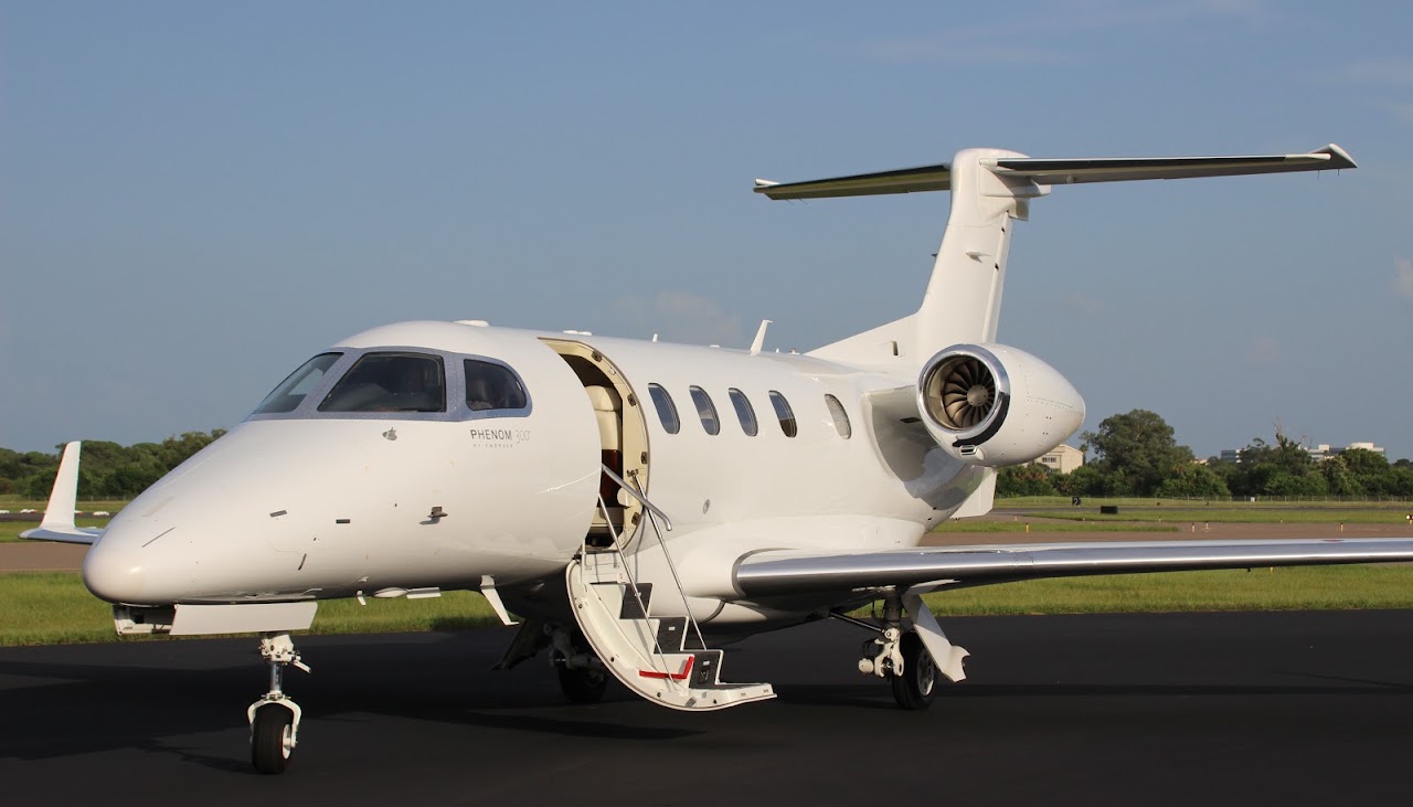 Phenom 300 N329MC on the ramp, airstair door open